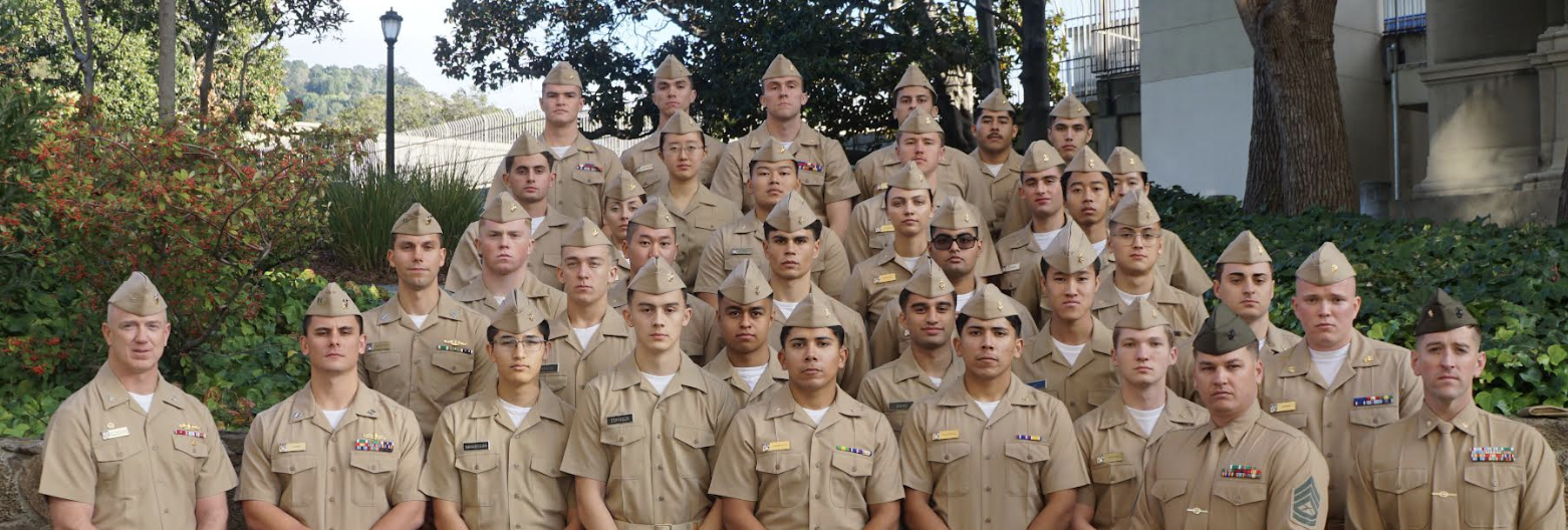 Midshipmen and Officers gathered together in military uniforms